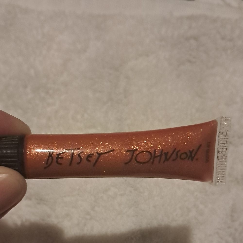 Betsey Johnson Shimmering Orange Lip Gloss